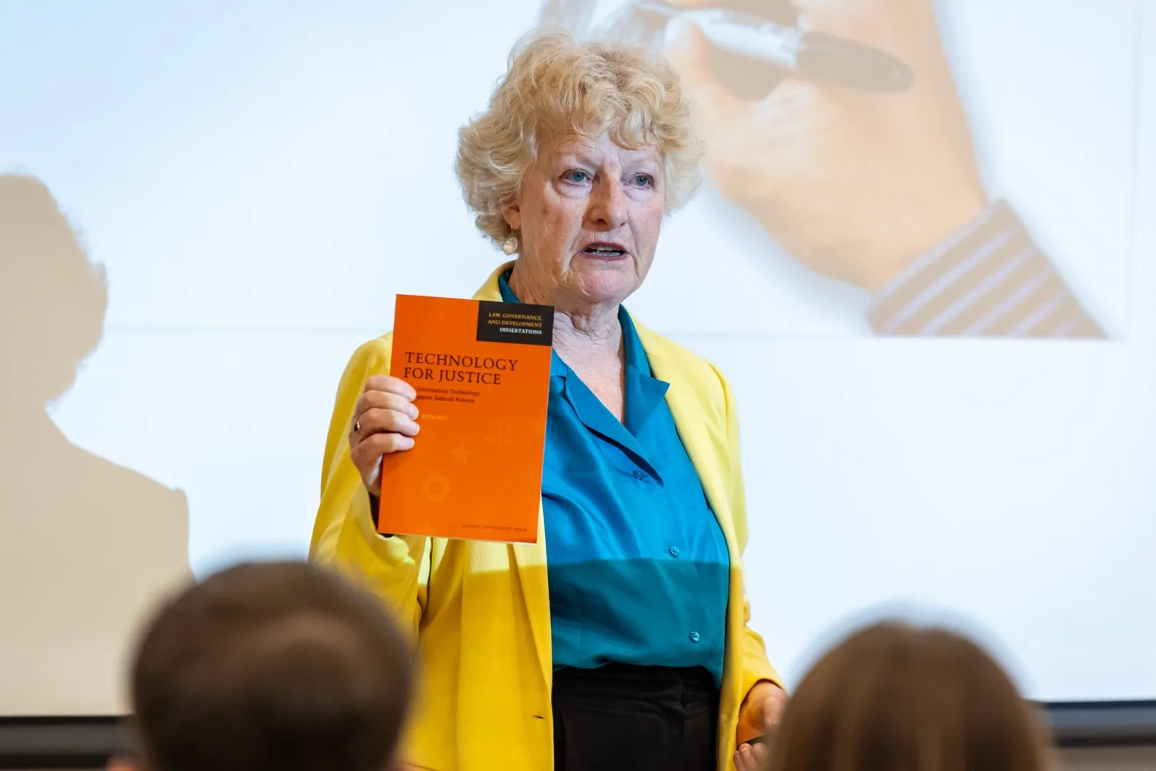 Dr Dory Reiling, an internationally recognised expert in the digitalisation of the justice system, with her book on the subject (Photo: Máté Dudás)